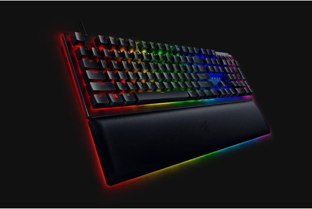 Clavier de jeu analogique Razer Huntsman V2 : activation réglable par commutateurs optiques analogiques, mode de déclenchement réactif, éclairage Chroma RGB, repose-poignets magnétique, touches multimédias et molette dédiées, noir.