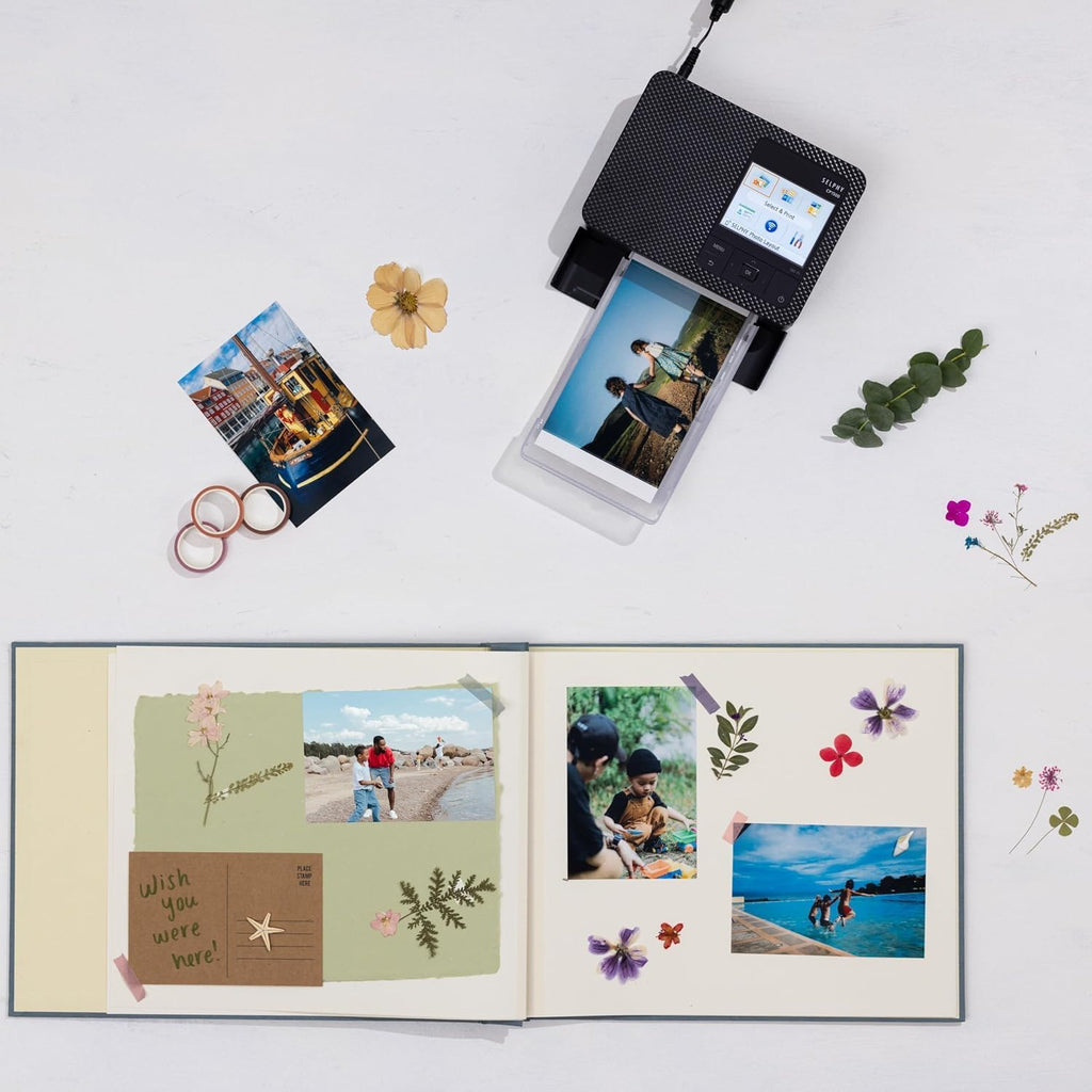 Imprimante photo Canon Selphy CP1500 (noire) doté de papier KP-108 (108 feuilles), 3 cartouches d'encre couleur et chiffon de nettoyage Tudak – Kit d'imprimante au format au format compact à connectivité sans fil à sublimation thermique