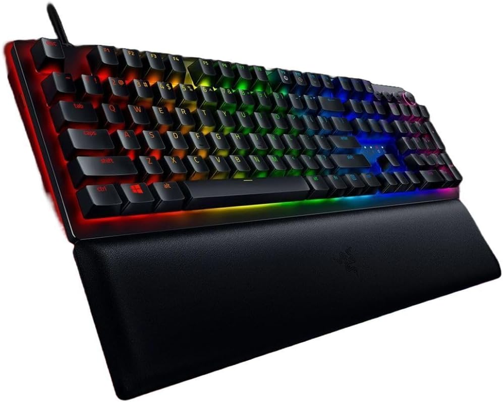 Clavier de jeu analogique Razer Huntsman V2 : activation réglable par commutateurs optiques analogiques, mode de déclenchement réactif, éclairage Chroma RGB, repose-poignets magnétique, touches multimédias et molette dédiées, noir.