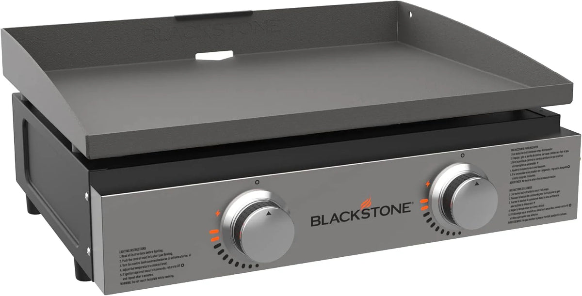Plaque de cuisson de table Blackstone 1666 de 56 cm (22 po) dotée de revêtement en poudre noir et surface en acier inoxydable.