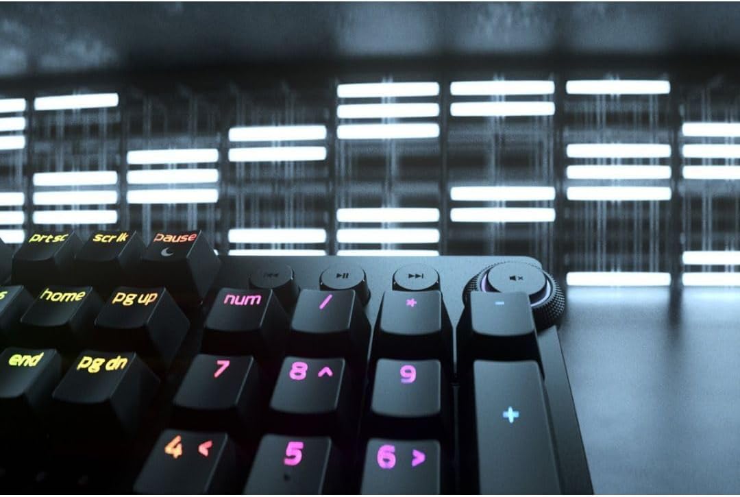 Clavier de jeu analogique Razer Huntsman V2 : activation réglable par commutateurs optiques analogiques, mode de déclenchement réactif, éclairage Chroma RGB, repose-poignets magnétique, touches multimédias et molette dédiées, noir.